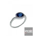 Valódi zafír kővel foglalt fehér arany gyűrű, brillekkel körbe foglalva. Klasszikus fazon.